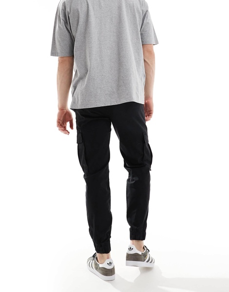 Bershka cuffed cargo pants in black