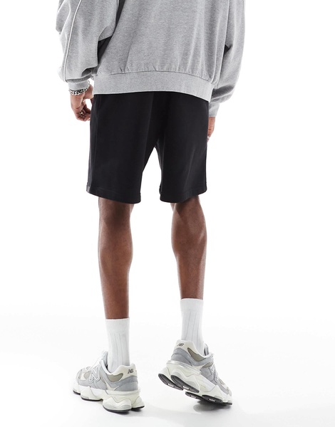 Bershka jersey shorts in black