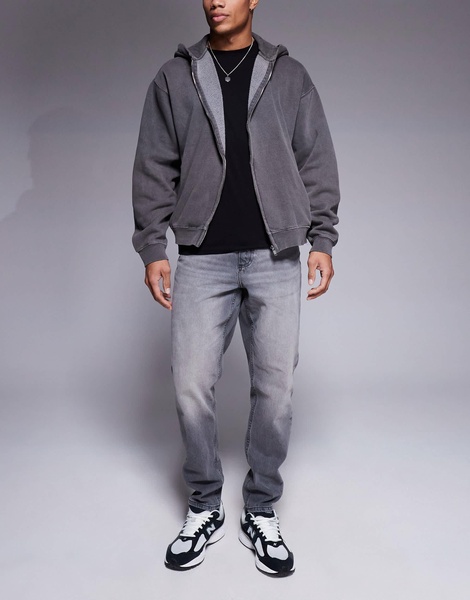 ASOS DESIGN tapered fit jeans in washed black