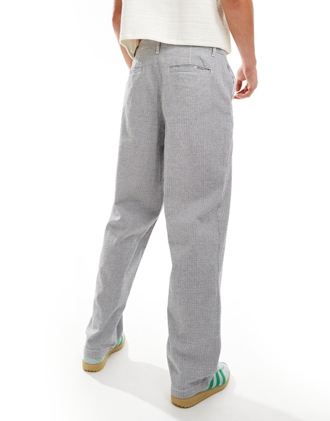 ASOS DESIGN baggy chino pants in black and white textured micro plaid