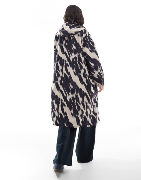 ASOS DESIGN shower proof rain jacket in black and white abstract