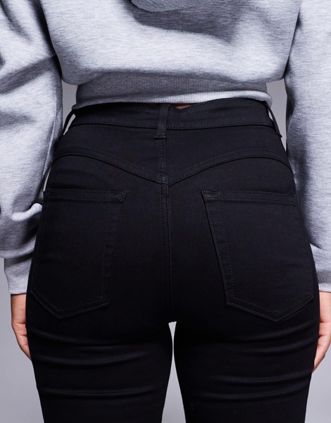 ASOS DESIGN sculpting super stretch flare jeans in black