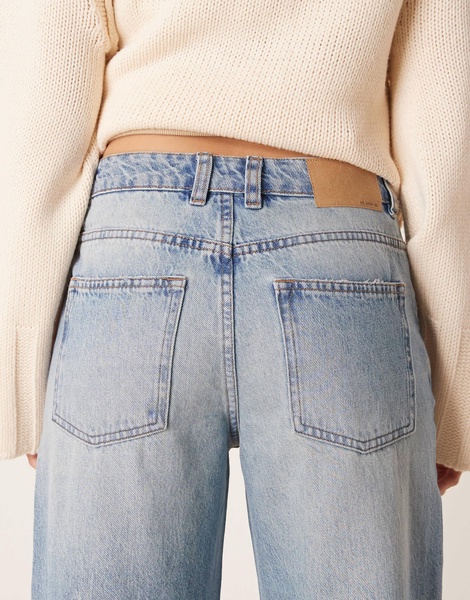 ASOS DESIGN baggy jean with rips in mid blue