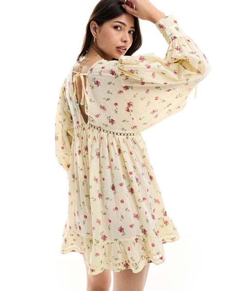 ASOS DESIGN Lace trim romper with full flippy shorts in ditsy print