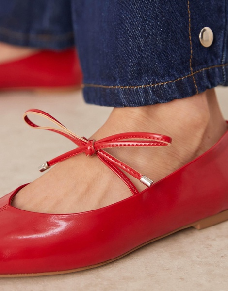 ASOS DESIGN Lithe pointed toe ballet flats with vamp tie in red