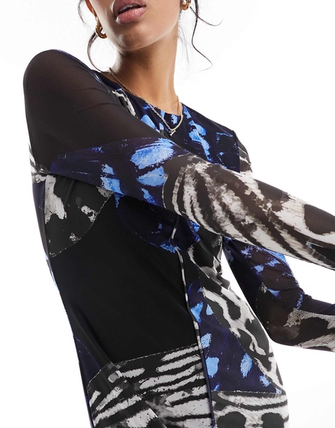 Vero Moda long sleeved lettuce edge mesh maxi dress in blue abstract butterfly print