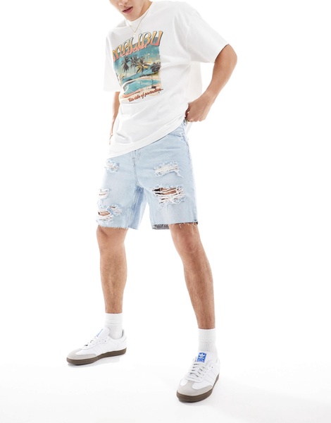 Bershka ripped denim shorts in light blue
