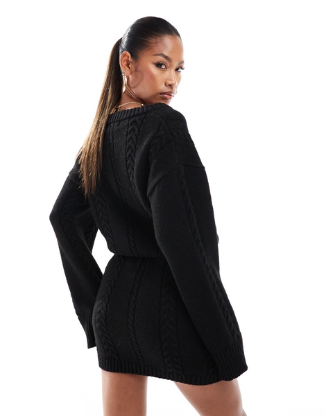 Aria Cove cable knit v neck mini sweater dress in black