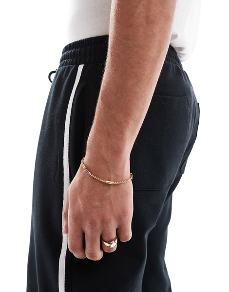 ASOS DESIGN straight leg sweatpants with textured side stripes in black