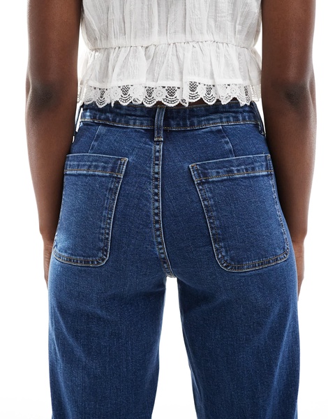 Bershka high waisted pocket detail jeans in mid wash