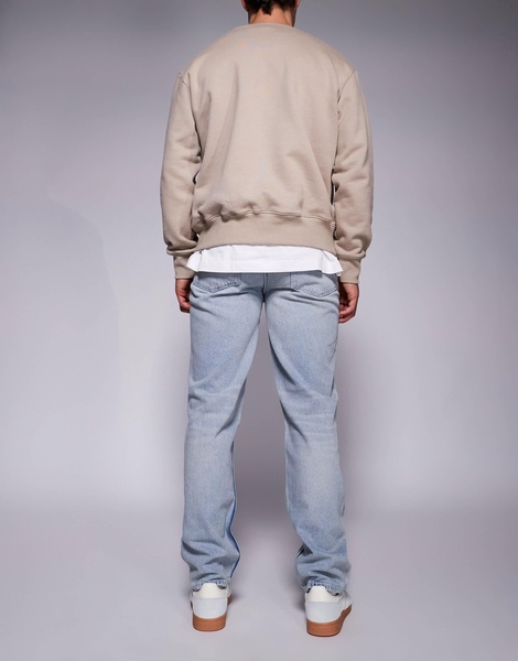 ASOS DESIGN straight leg jeans in light wash blue