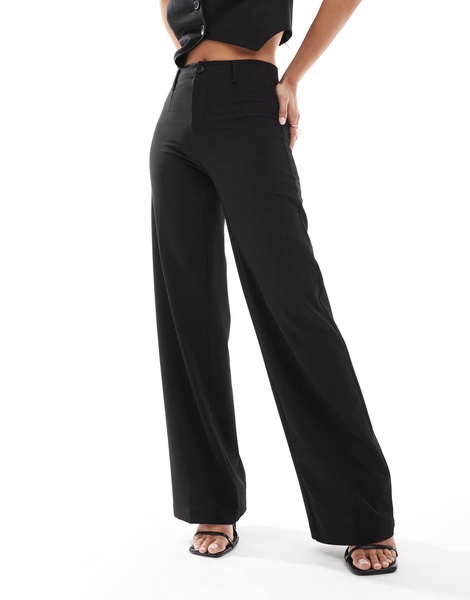 Bershka Petite tailored pants in black