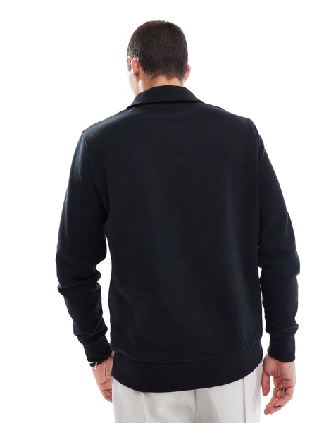 ASOS DESIGN polo sweatshirt with zip in black
