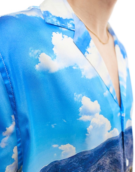 ASOS DESIGN relaxed deep revere satin shirt with scenic desert print