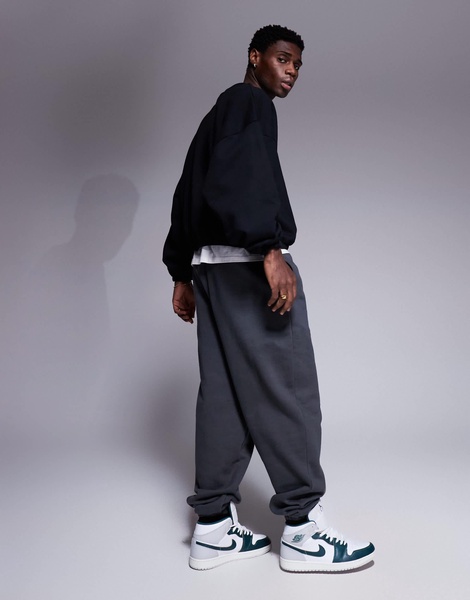 ASOS DESIGN heavyweight boxy extreme oversized sweatshirt with elasticized cuffs and hem in black
