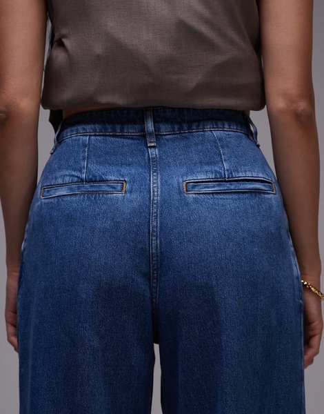 ARKET super soft denim wide leg pants with tailored waistband and pleat front in mid wash blue