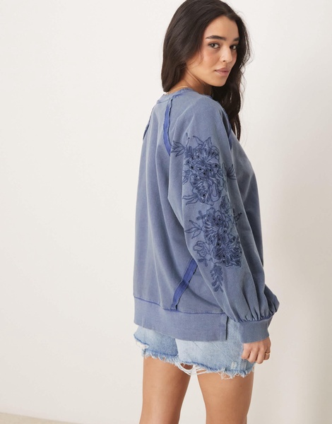 ASOS DESIGN oversized sweat with seam detail and cutwork sleeves in washed blue