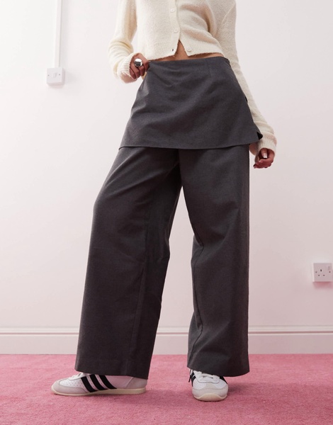 Reclaimed Vintage mini skirt over pants in gray