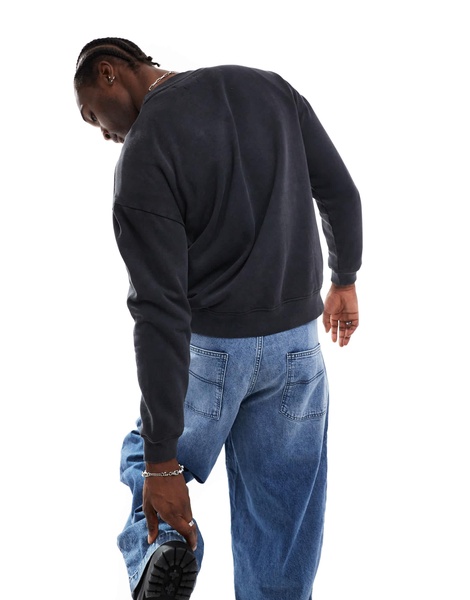 Another Influence round neck acid wash sweatshirt in black