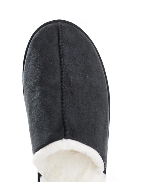 ASOS DESIGN mule slippers in black with faux shearling lining