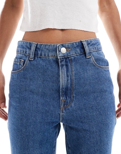 ASOS DESIGN super high waist flared jeans in mid blue