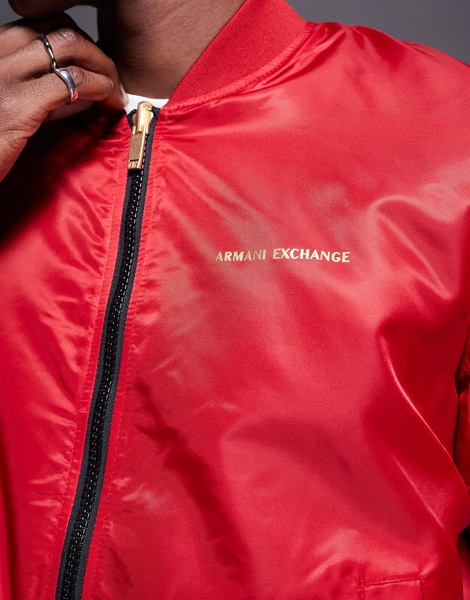 Armani Exchange reversible lunar capsule snake bomber jacket in black and red