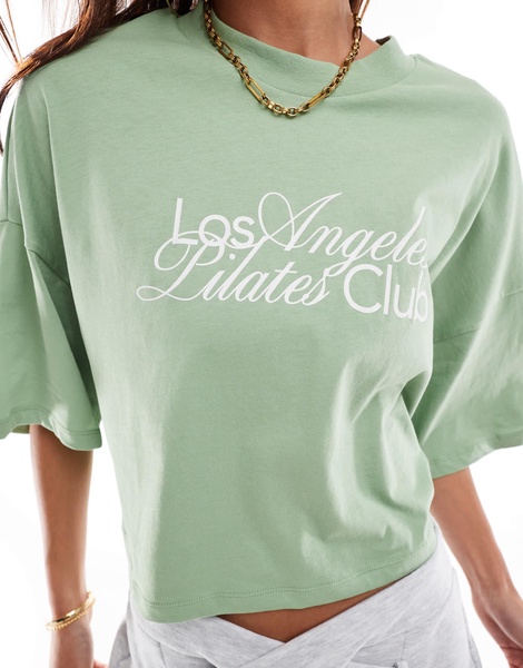 ONLY LA Pilates Club print cropped t-shirt in light green