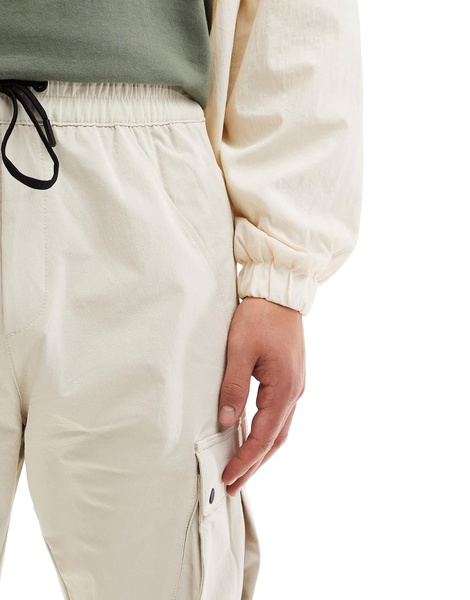 Bershka tech cargo pants in sand
