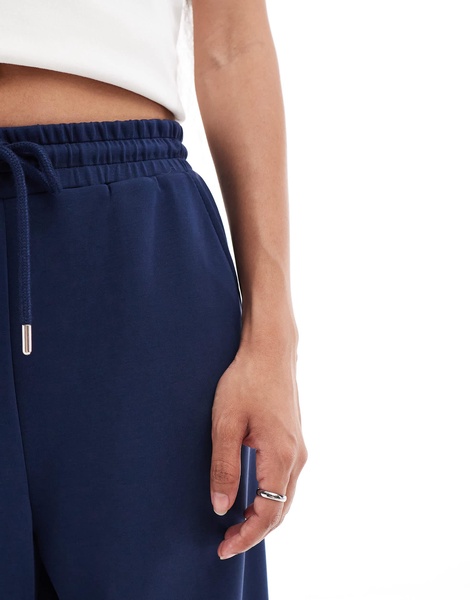 Stradivarius Petite soft touch wide leg sweatpants in navy