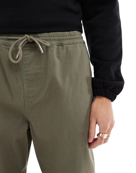 ASOS DESIGN tapered pull on chino with elastic waist in khaki