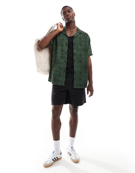 ASOS DESIGN relaxed revere shirt with tile print in green