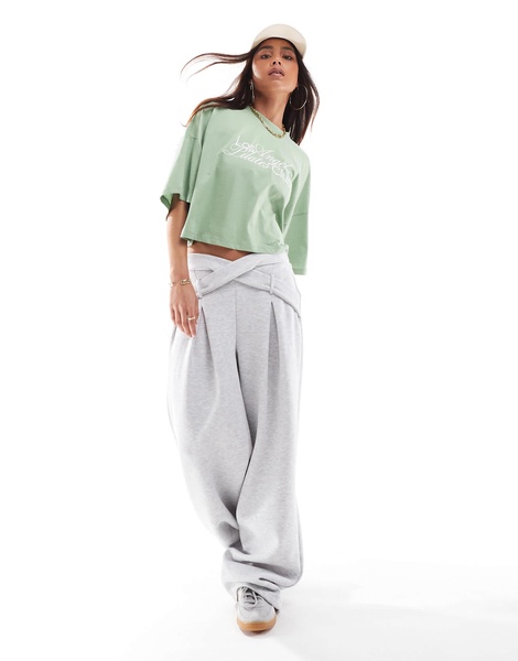 ONLY LA Pilates Club print cropped t-shirt in light green