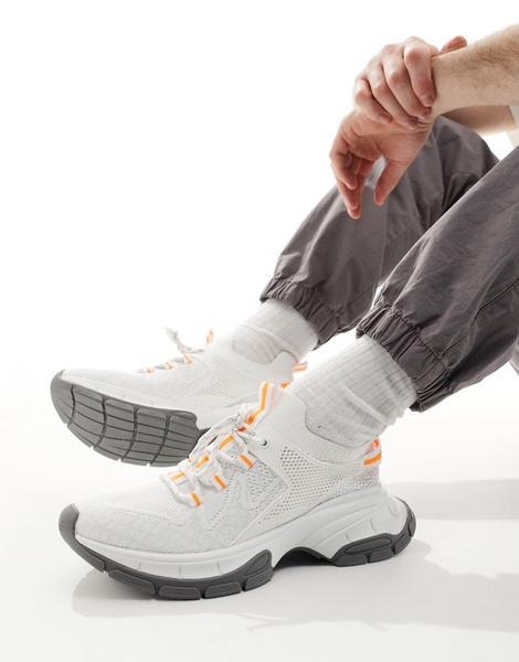 ASOS DESIGN chunky knit sneakers in white and orange