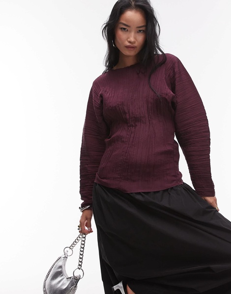 ARKET plisse top with sculptural sleeves in burgundy