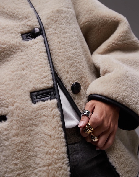 Mango contrast detail collarless faux shearling jacket in ecru