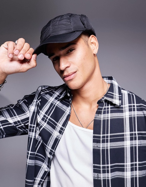 ASOS DESIGN nylon puffer trapper cap in black