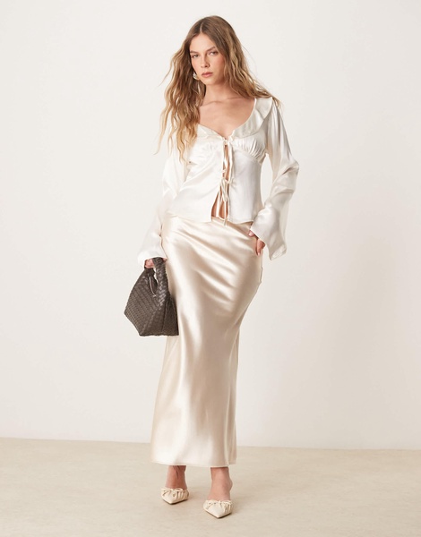 ASOS DESIGN satin ruffle tie front blouse in ivory