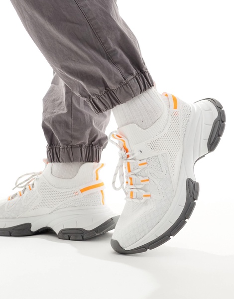 ASOS DESIGN chunky knit sneakers in white and orange