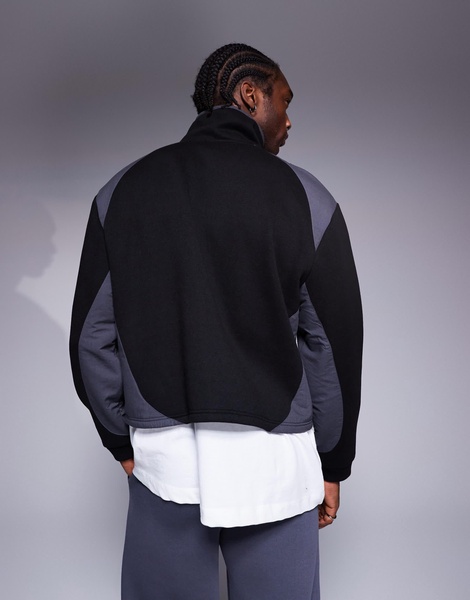 ASOS DESIGN oversized dropped shoulder boxy funnel neck sweatshirt in with nylon panels in black