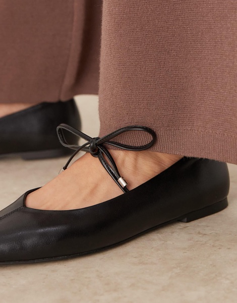 ASOS DESIGN Lithe pointed toe ballet flats with vamp tie in black