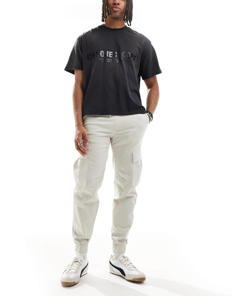 Bershka cuffed cargo pants in beige