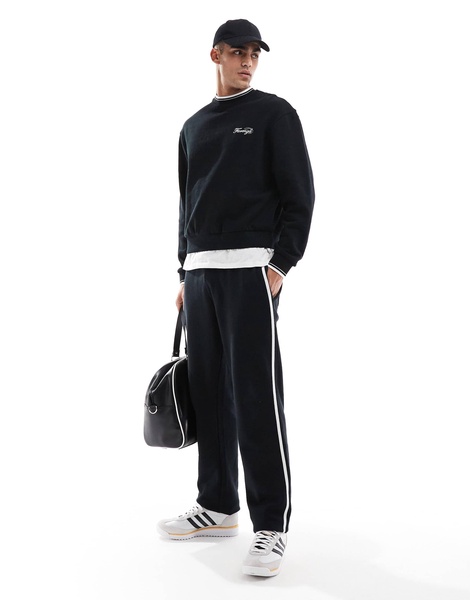 ASOS DESIGN straight leg sweatpants with textured side stripes in black