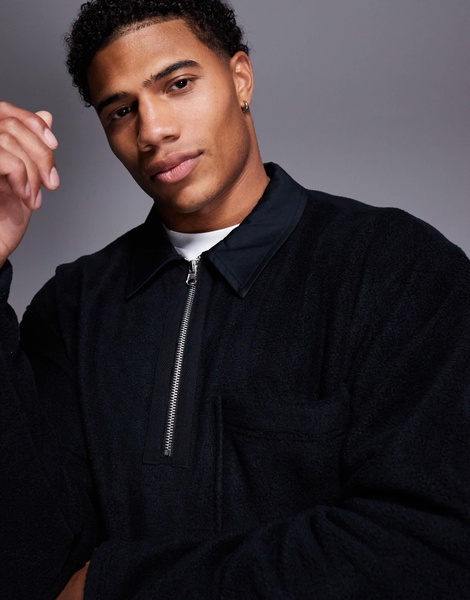 ASOS DESIGN oversized rugby polo fleece sweatshirt with quarter zip in black