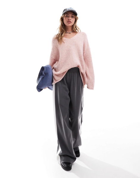 ASOS DESIGN loose knit oversized V-neck sweater in pink