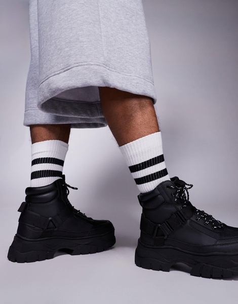 ASOS DESIGN lace up worker boots in black with chunky sole and straps
