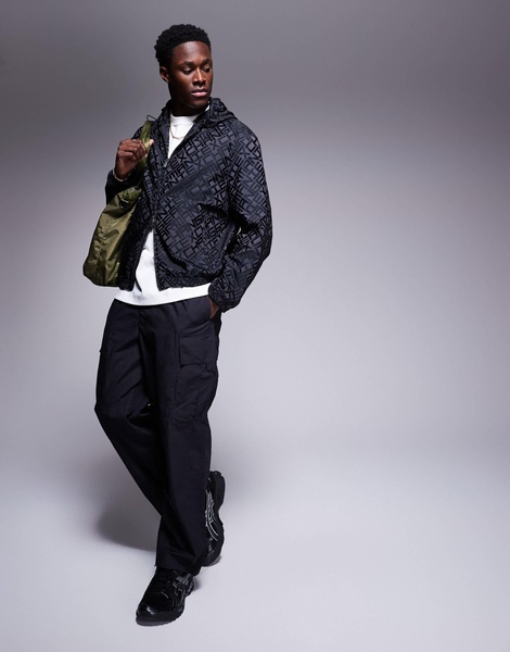 Armani Exchange all over logo hooded jacket in black