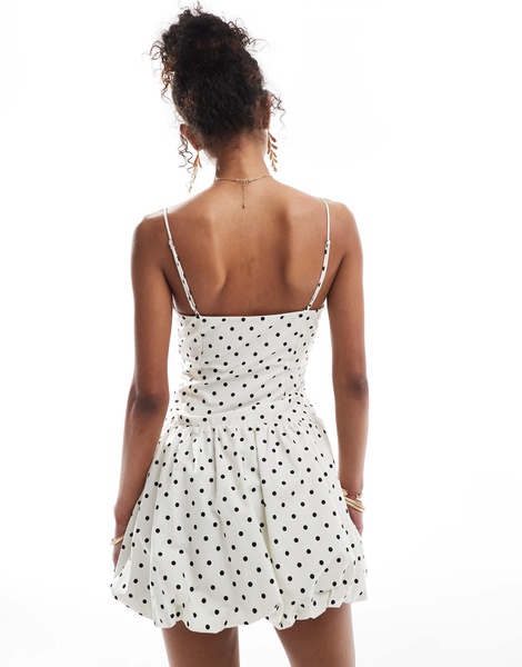Bershka bubble hem mini dress in ecru polka dot