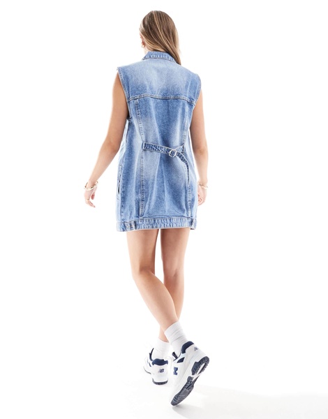 Bershka oversized longline denim vest in indigo wash