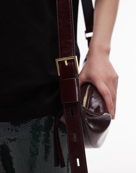 AllSaints half moon leather crossbody bag in burgundy