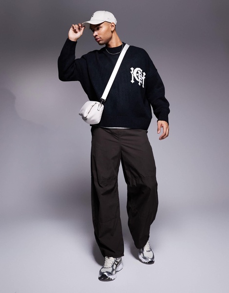 ASOS DESIGN super oversized boxy fit knitted crew neck sweater with city text pattern in navy
